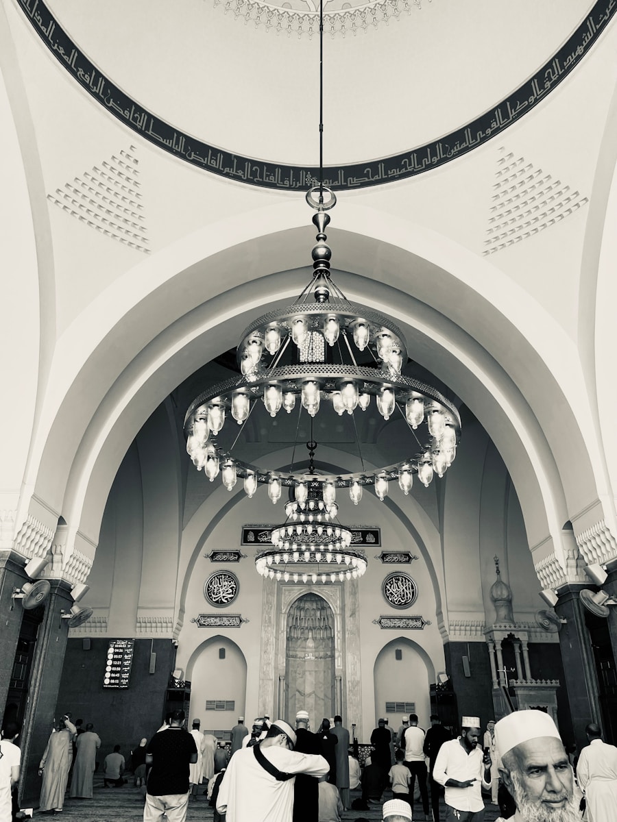 a group of people standing in a large building
